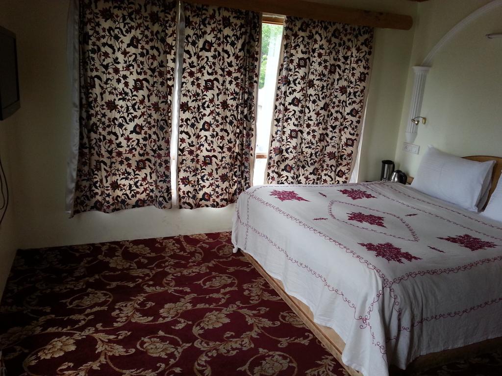 Hotel Paradise Inn Pahalgām Zimmer foto
